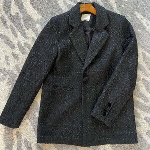 a loves a tweed jacket